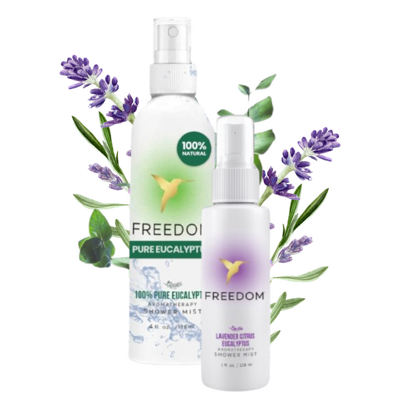 Two bottles of Freedom Pure Eucalyptus shower mist with lavender flowers on a white background