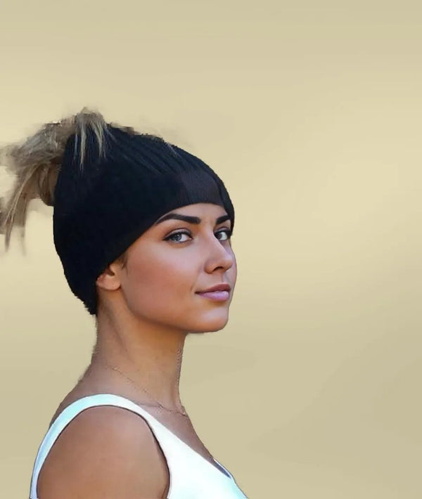 Purely Alpaca messy bun hat styled with hair pulled through top opening