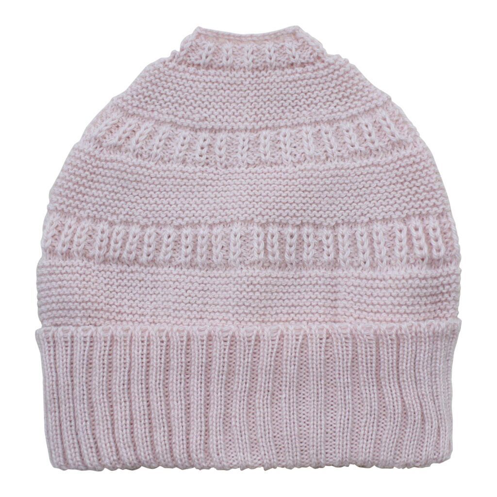 Knitted dog sweater in pink on a white background