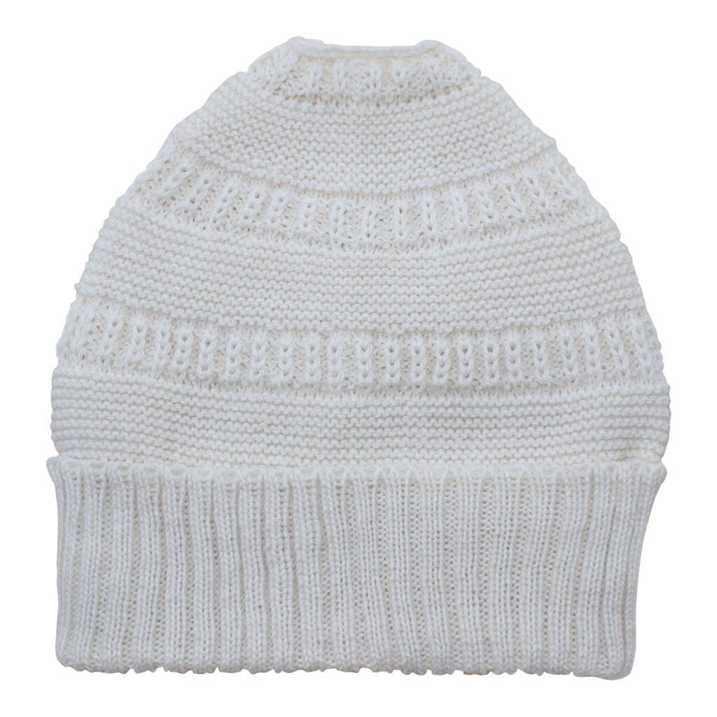 White knitted dog sweater on a white background