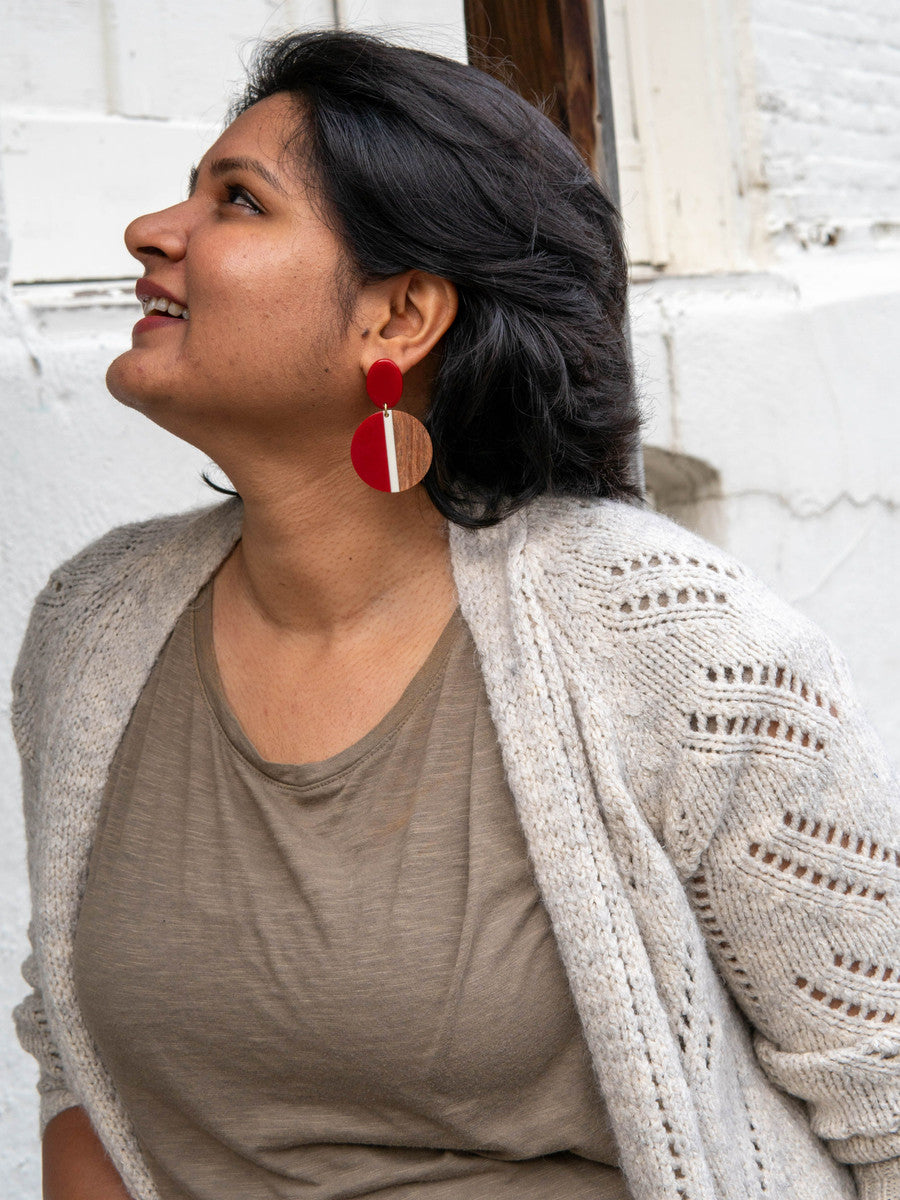 Fair Anita mod circle earrings in red resin and sustainable volcano wood — side view