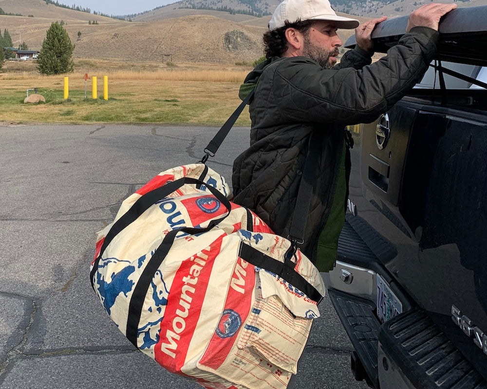 The Large Transport Duffel is the ultimate versatile bag for your adventures. Made from recycled materials and featuring a spacious design, this durable bag is perfect for travel, camping, sports, or storage. Experience the perfect combination of function and sustainability. Order yours today!