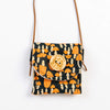 Small bag with mushroom pattern and wooden emblem on a white background