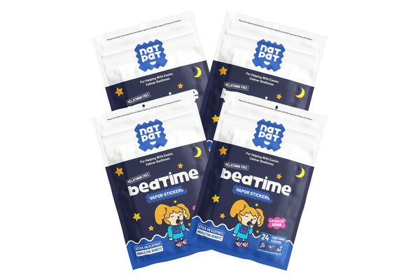 Packages of 'not pet' bedtime vapor stickers on a white background