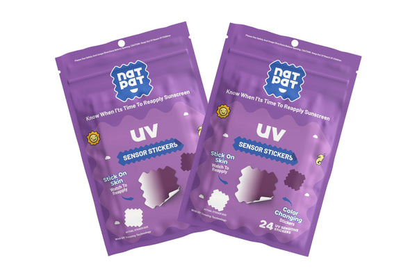 Two purple packages of Natrapat UV Sensor Stickers on a white background. 