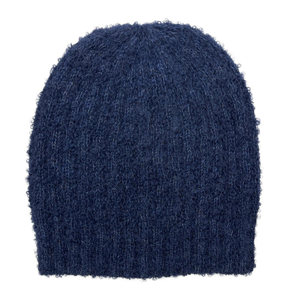 Blue textured beanie on a white background
