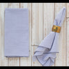 Navy blue seersucker reusable cloth dinner napkins set of 4 on a wooden table