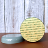 Round container labeled 'ECO Sensitive' on a wooden surface with a blurred background