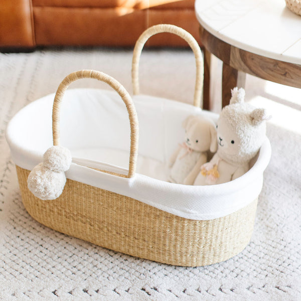 Plum+Sparrow No Hood Moses Basket Liner in 100% cotton, styled inside a woven moses basket