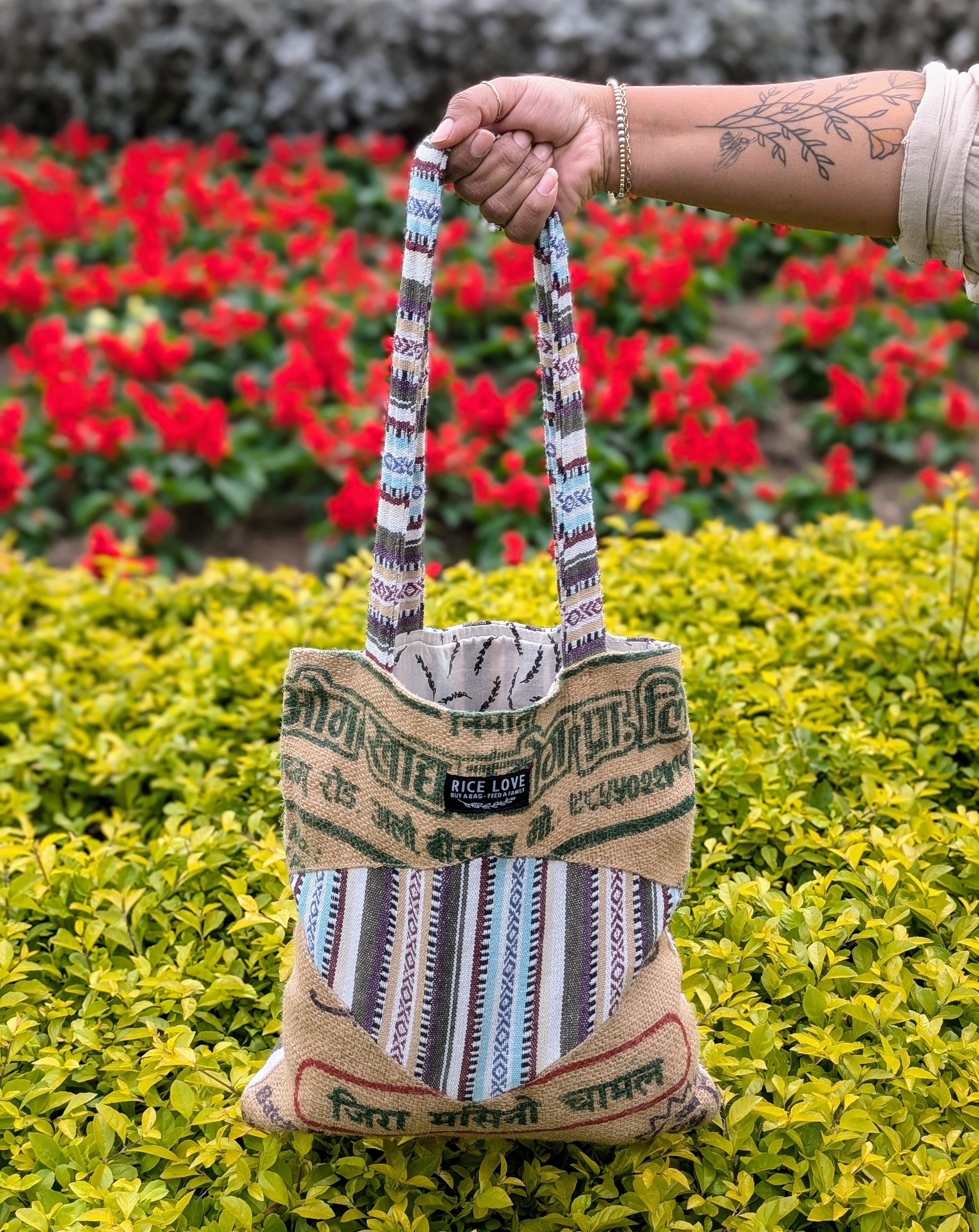 One of a Kind Mini Tote paired with its unique tag detailing the rice donation
