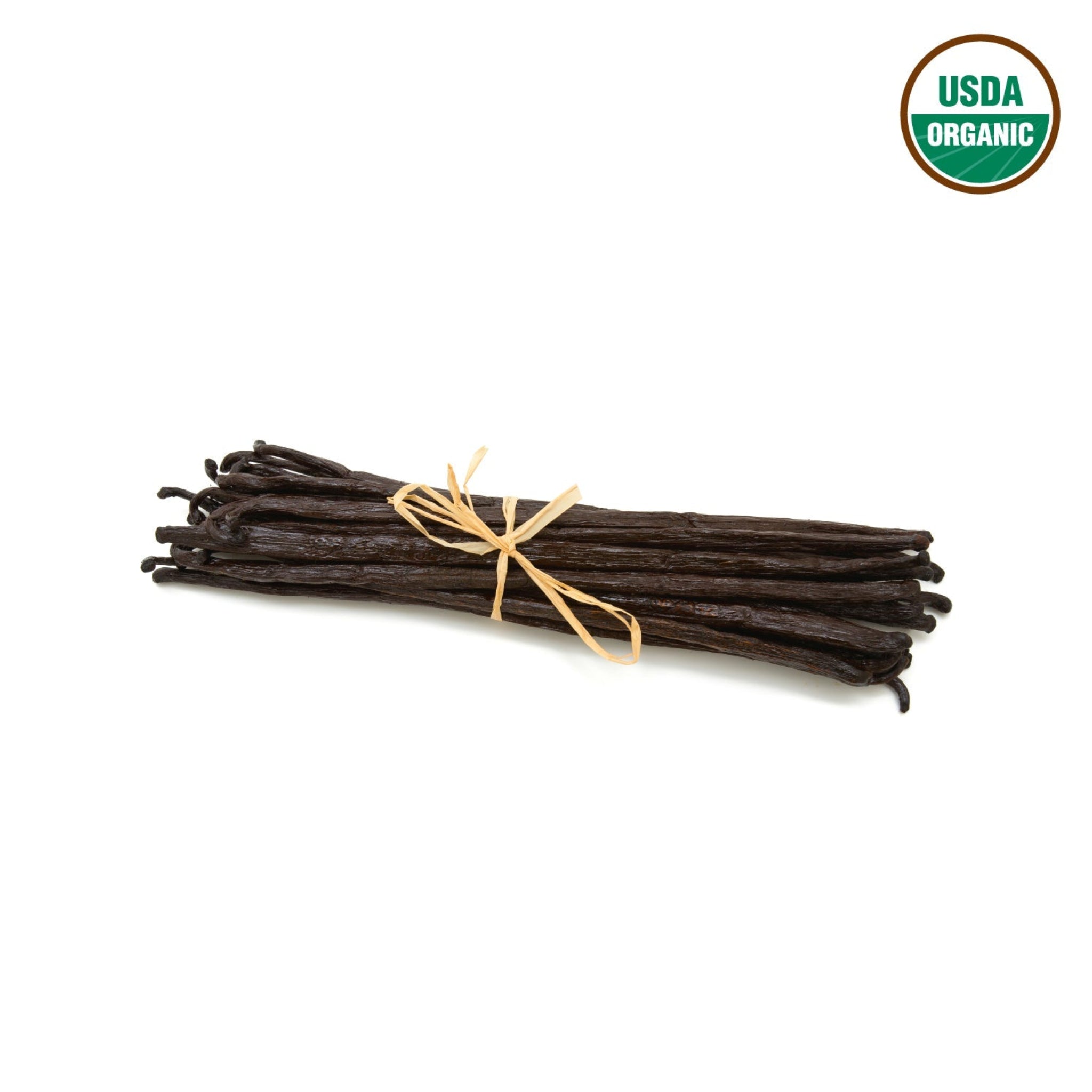 Bundle of vanilla beans tied with twine on a white background with USDA Organic label. Discover the rich, creamy flavor of our USDA Organic Grade A Madagascar Vanilla Beans. Perfect for baking, homemade vanilla extract, and gourmet desserts, these Bourbon vanilla pods are the gold standard for quality.