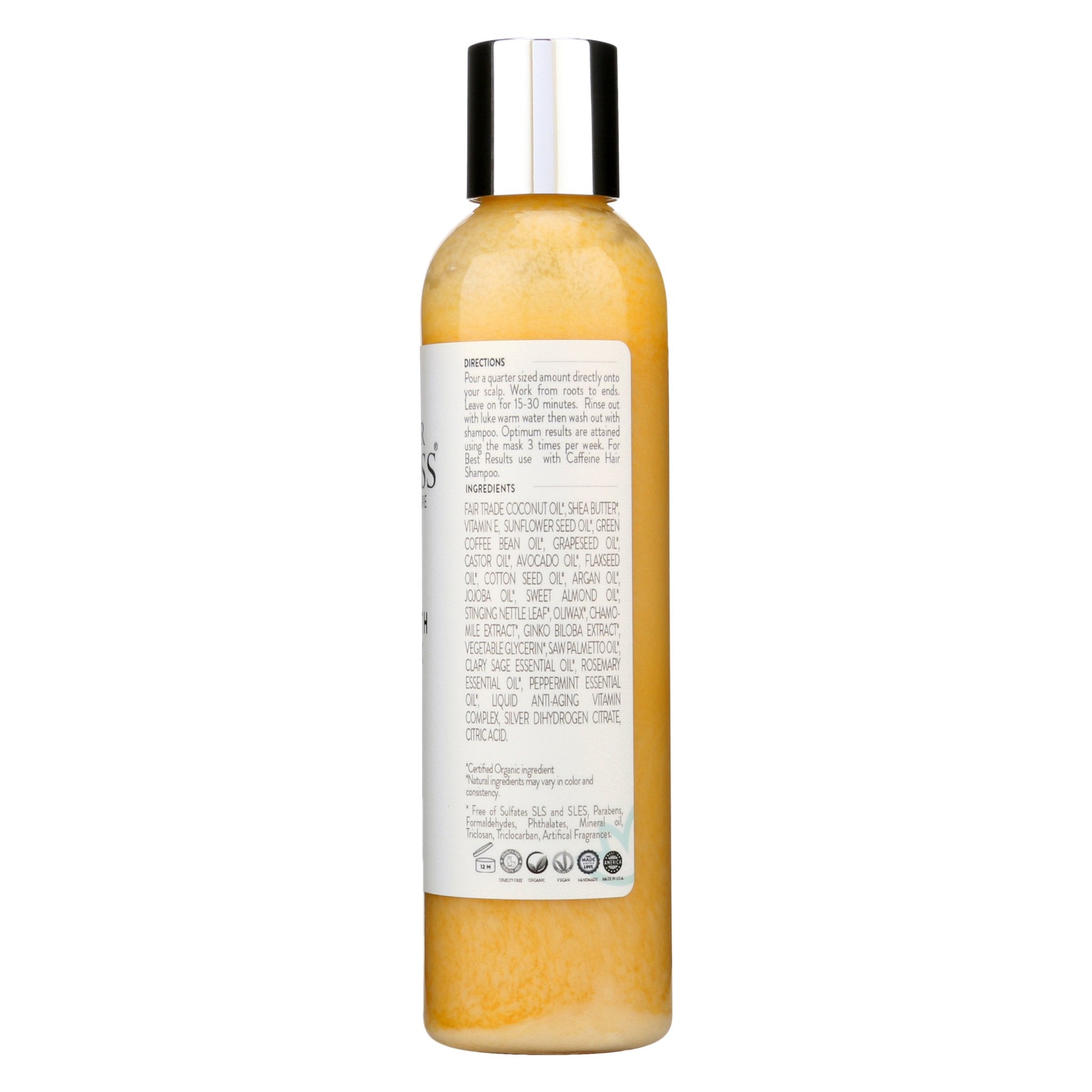 Woman applying organic caffeine hair growth mask to scalp for DHT blocking and strengthening treatment