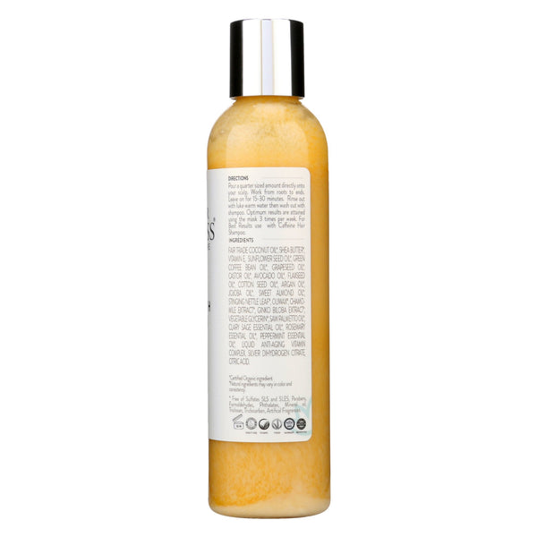 Woman applying organic caffeine hair growth mask to scalp for DHT blocking and strengthening treatment