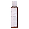 Close-up of Organic Caffeine Hair Growth Serum label showing key ingredients including rosemary and castor oil