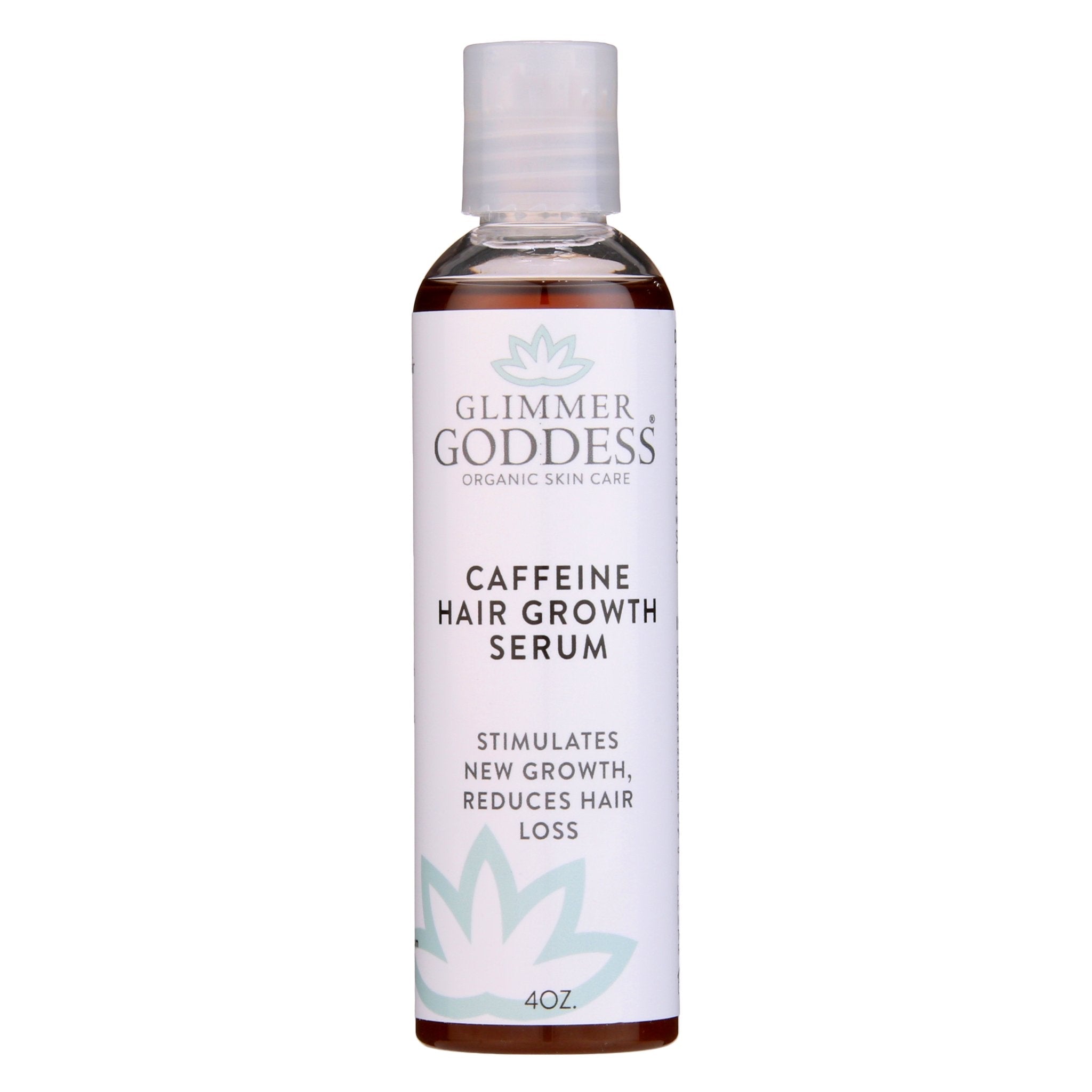Organic Caffeine Protein Hair Growth Serum by Glimmer Goddess in amber bottle on neutral background
