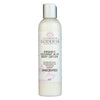 Close-up of organic coconut milk body lotion texture showing creamy, lightweight consistency