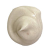 Close-up of a swirl of light-colored cream or frosting on a white background