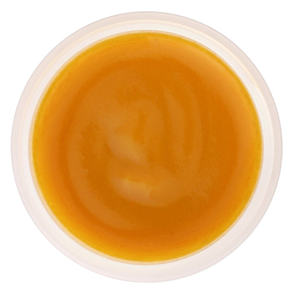 Close-up of Glimmer Goddess Organic Pumpkin AHA Exfoliating Face Mask texture in jar