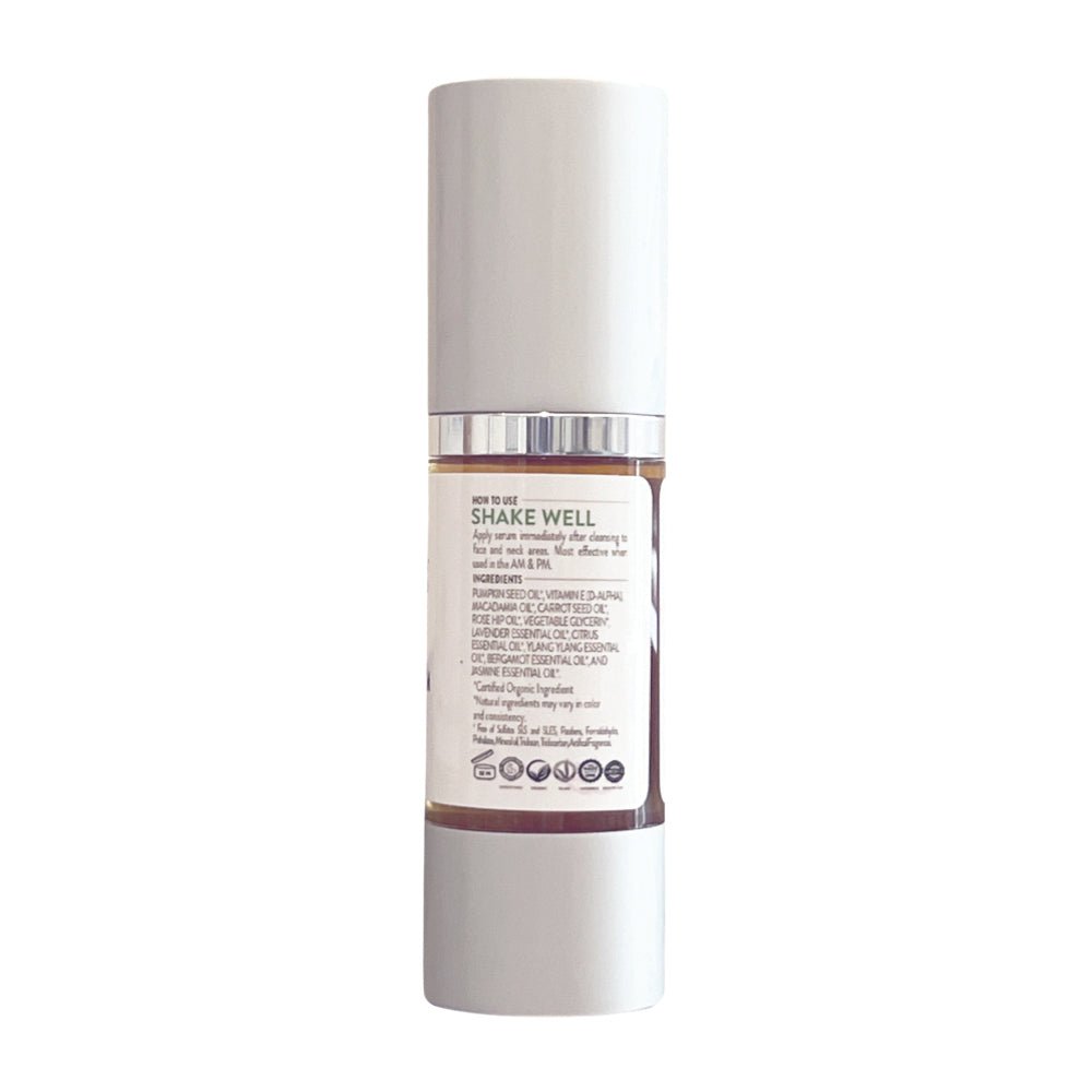 Skincare serum bottle with label on a white background