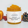 Close-up of Glimmer Goddess organic pumpkin sugar scrub texture showing brown sugar crystals and rich scrub consistency