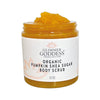 Organic pumpkin shea sugar body scrub by Glimmer Goddess in a glass jar, with brown sugar and pumpkin ingredients