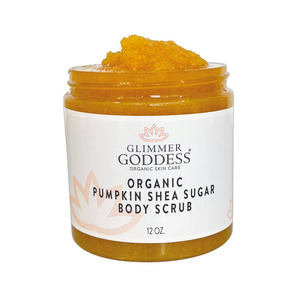 Organic pumpkin shea sugar body scrub by Glimmer Goddess in a glass jar, with brown sugar and pumpkin ingredients
