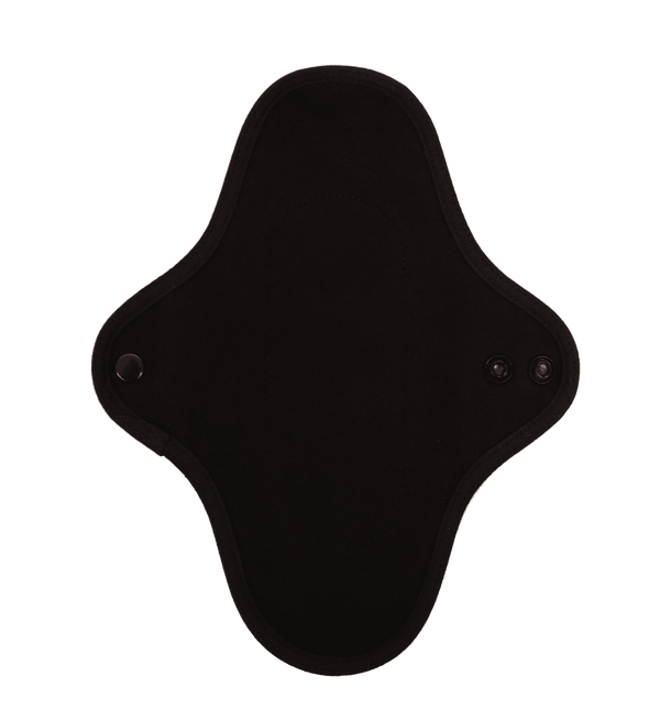Close-up of hannahPAD black reusable pantyliner showing recyclable plastic snaps and breathable organic fabric detail