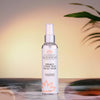 Organic rose water toner applied with cotton pad on clean skin for radiant complexion