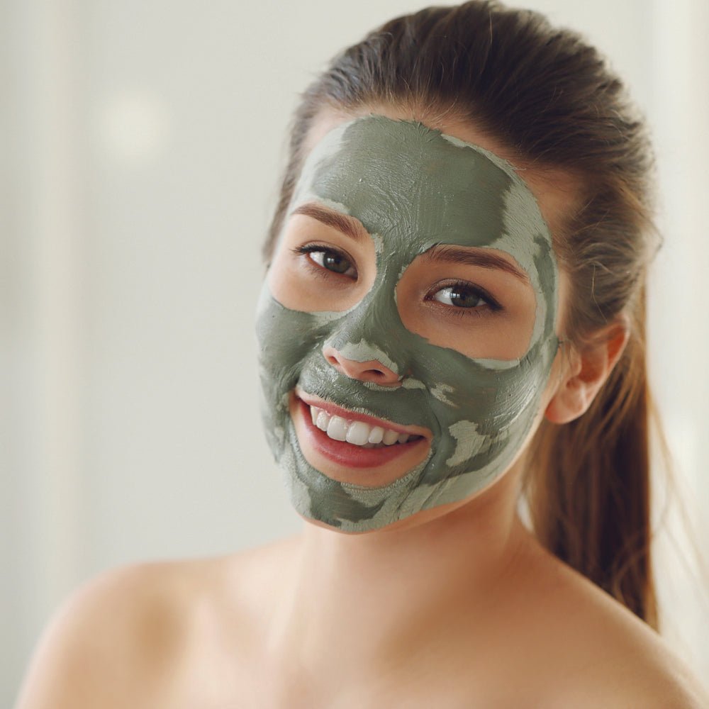 Close-up of Glimmer Goddess Organic Rosemary Mint Algae Face Mask texture showing rich clay formula