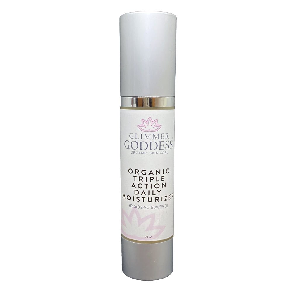 Glimmer Goddess organic triple action daily moisturizer bottle on a white background