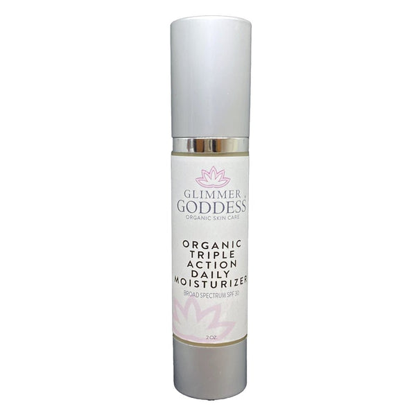 Glimmer Goddess organic triple action daily moisturizer bottle on a white background