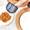 Protect your hands in style with our Double-Ended Oval Pot Holder. This versatile kitchen accessory is made from sustainable cotton and offers double the protection against heat.