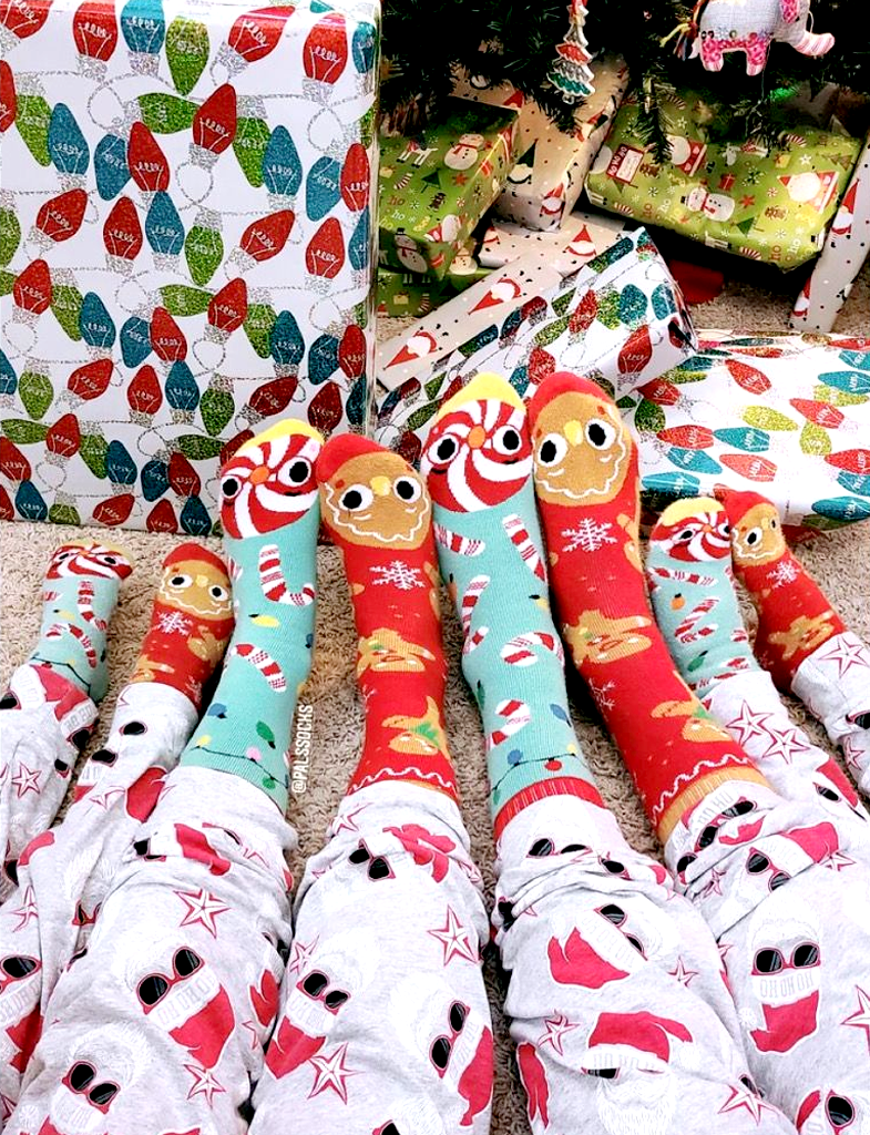 Add a touch of holiday cheer to your wardrobe with our Gingerbread & Candy Cane mismatched socks. These cozy and comfortable socks are perfect for the whole family.