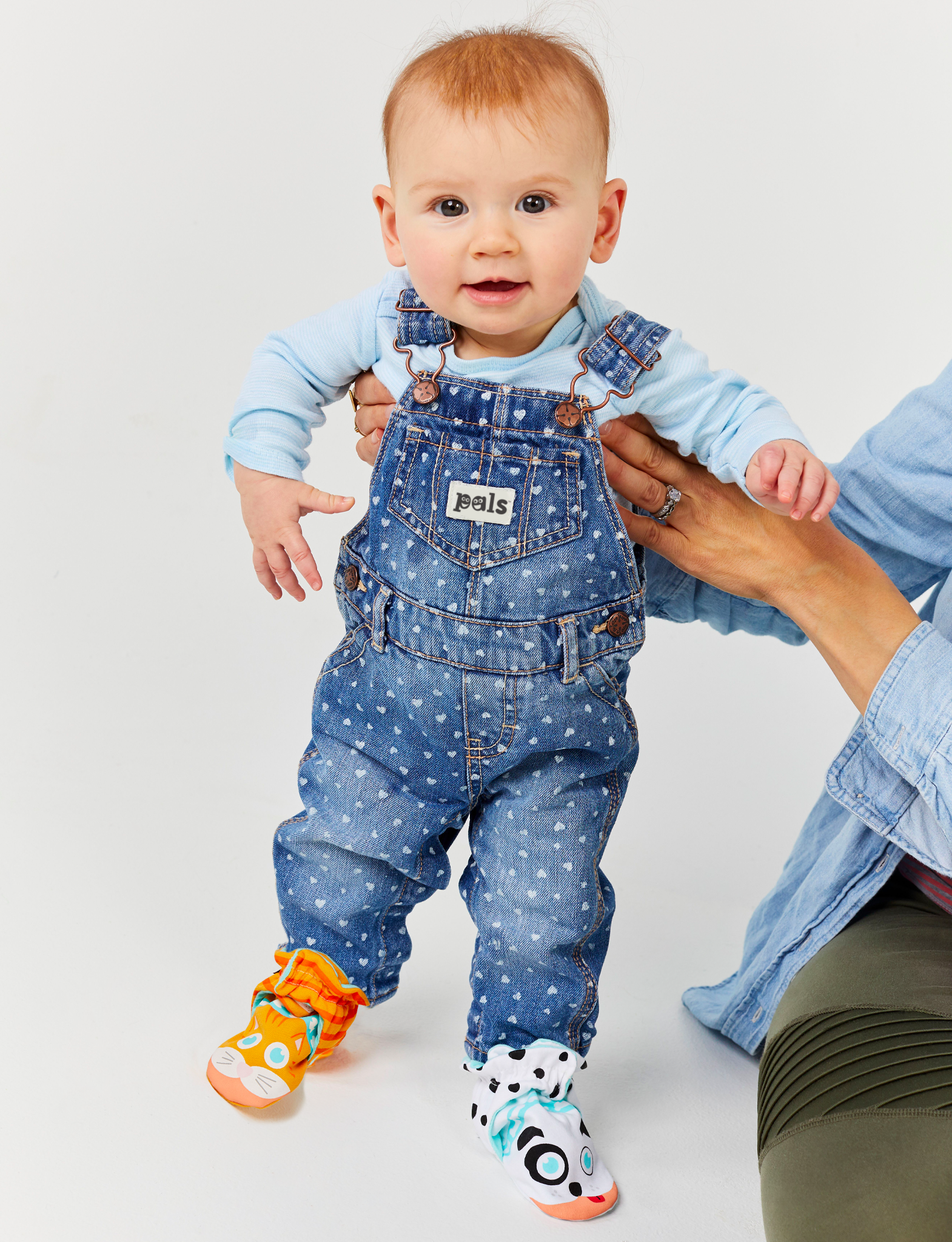 The perfect gift for new parents! This eco-friendly bundle includes cozy baby booties and comfy adult socks, all made with sustainable materials.