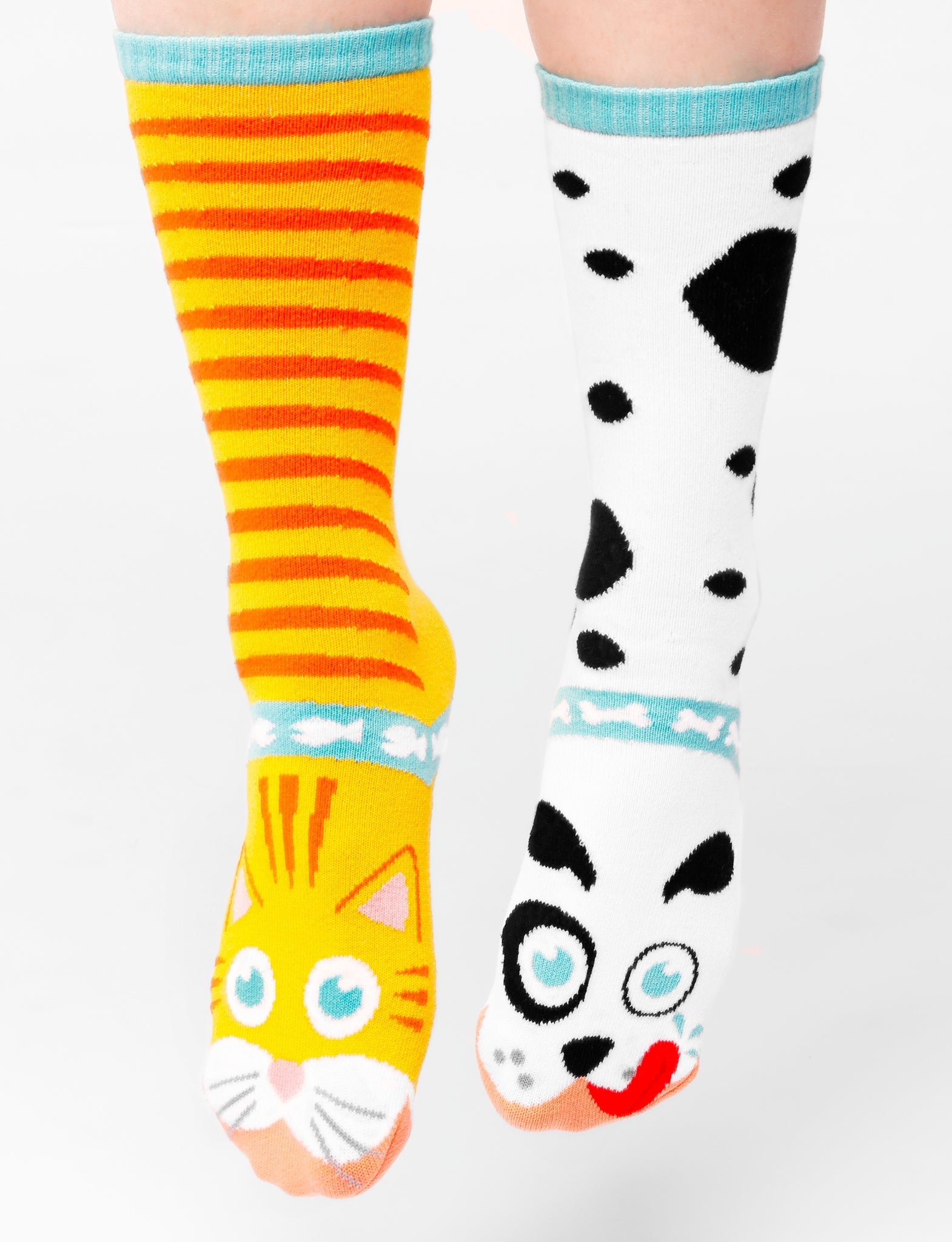 Add a playful touch to your wardrobe with these adorable mismatched cat and dog socks. These eco-friendly and comfortable socks are perfect for anyone who loves animals and unique style.