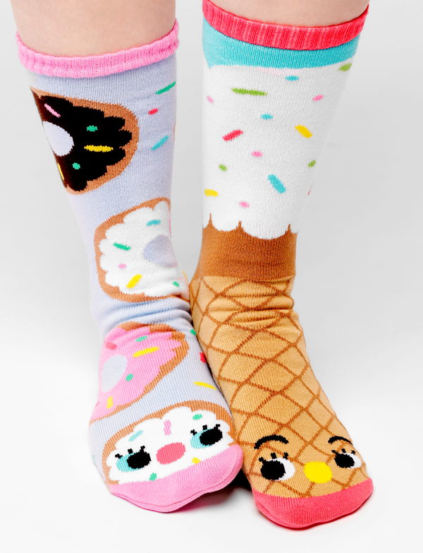 Add a sprinkle of fun to your day with our Donut and Ice Cream mismatched socks. These cozy and comfortable socks are perfect for anyone with a sweet tooth.