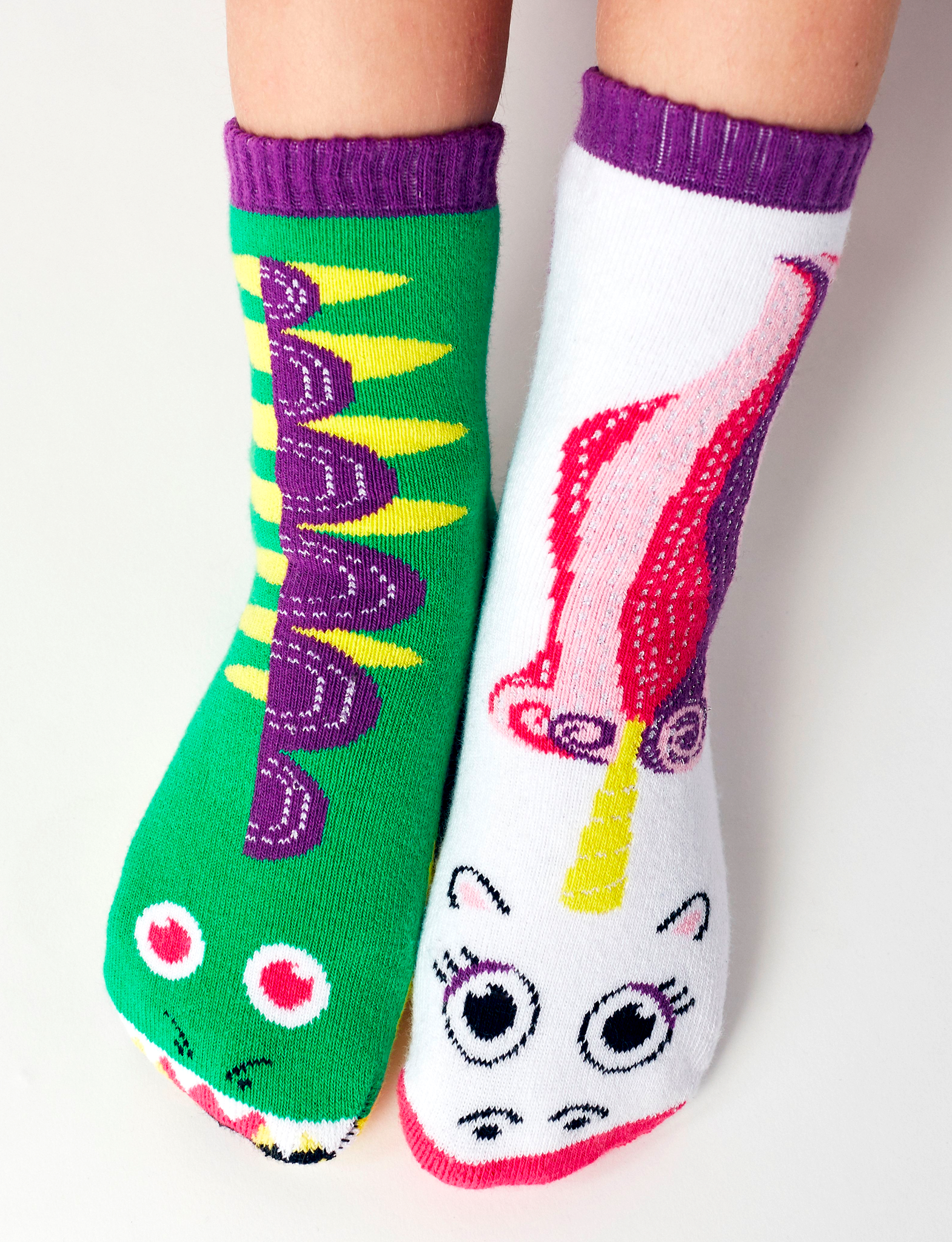 Discover the magic of our Dragon & Unicorn Mismatched Socks. These playful socks are perfect for adding a touch of enchantment to your child's wardrobe. Not only are they fun and stylish, but they also promote empathy and acceptance. Order yours today!