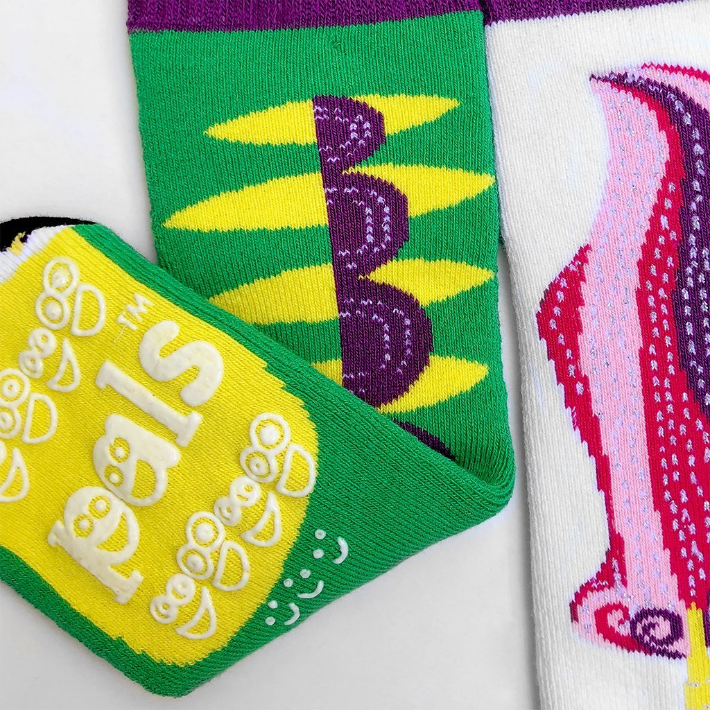 Discover the magic of our Dragon & Unicorn Matchy Mismatched Socks. This adorable set features sparkly designs and is perfect for sharing with a loved one. Not only are they fun and stylish, but they also promote empathy and acceptance. Order yours today!