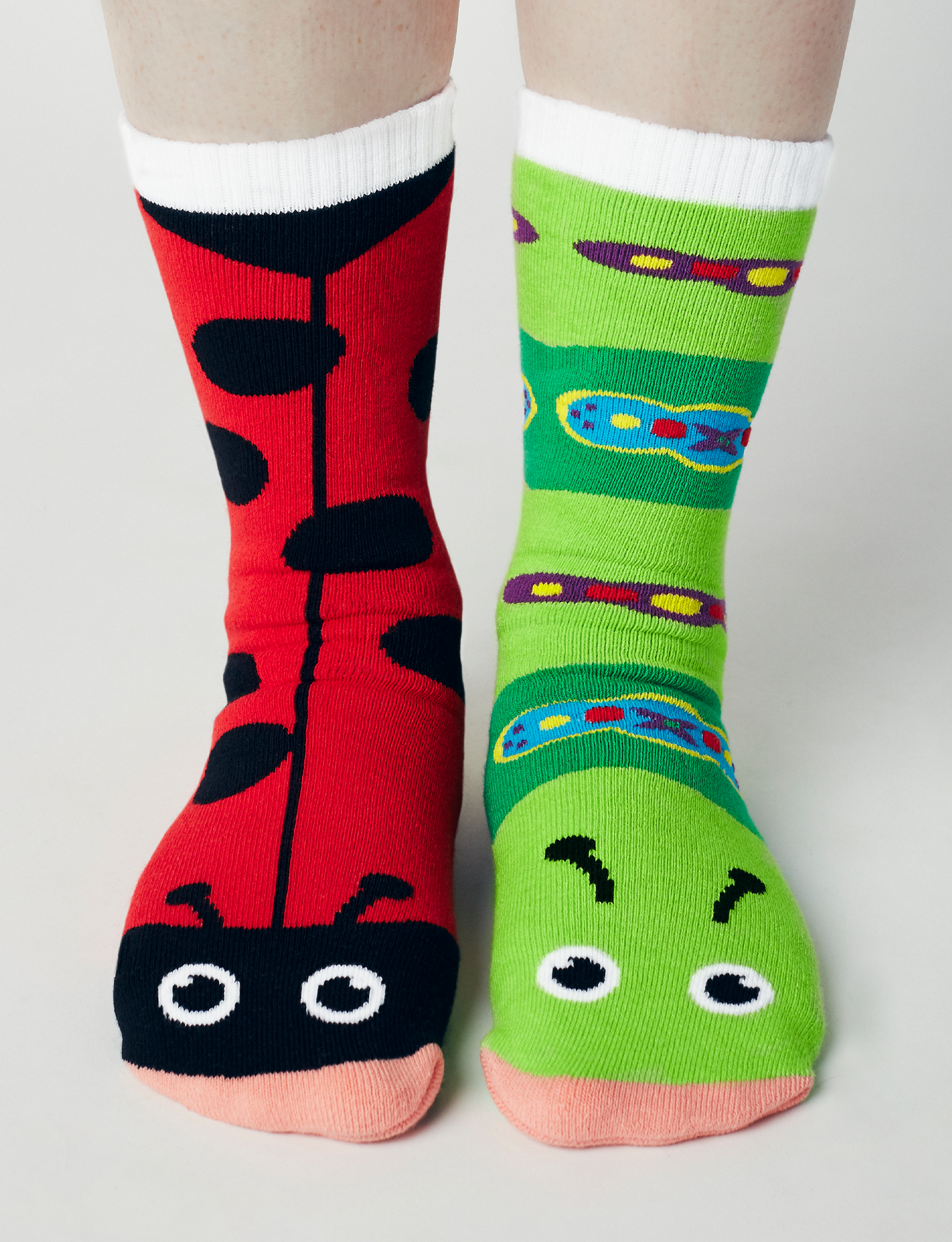 Add a touch of whimsy to your day with our Ladybug and Caterpillar mismatched socks. These soft and comfortable socks are perfect for anyone who loves bugs and fun.