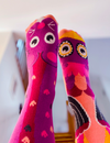 Add a touch of whimsy to your day with our Owl and Mouse mismatched socks. These soft and comfortable socks are perfect for anyone who loves animals and fun.