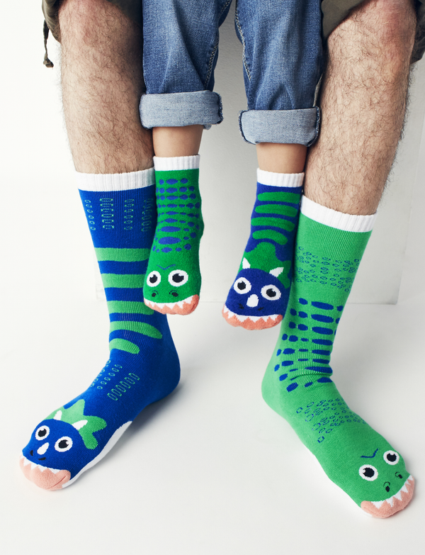 Add a touch of fun to your wardrobe with our mismatched dinosaur socks. These comfortable and stylish socks are perfect for kids and adults.