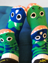 Add a touch of fun to your wardrobe with our mismatched dinosaur socks. These comfortable and stylish socks are perfect for kids and adults.