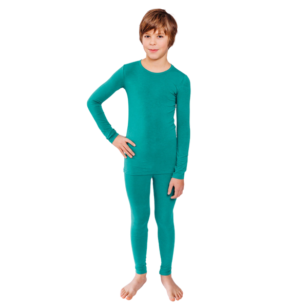 Child wearing Remedywear eczema top and pants set in a soft, form-fitting design
