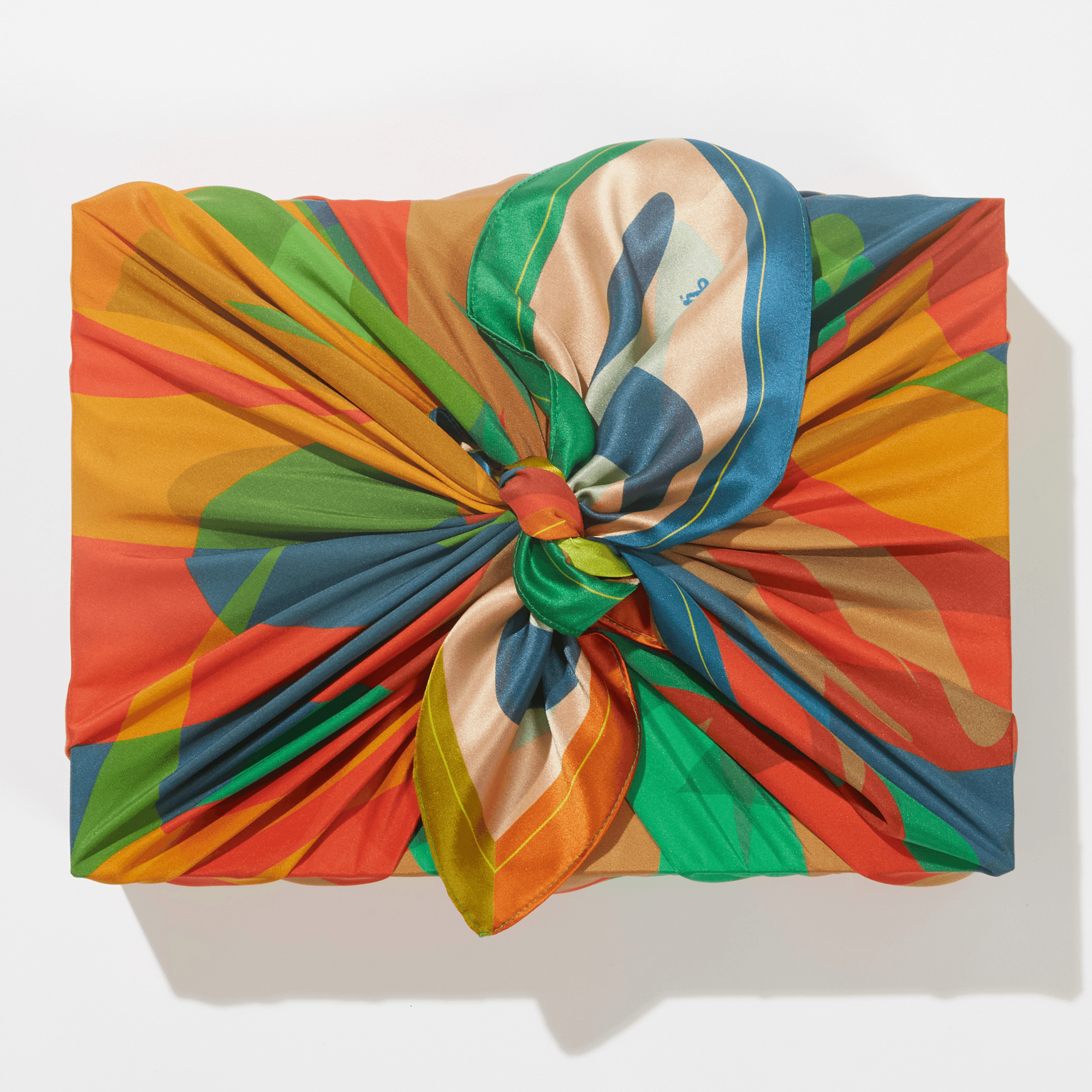 Colorful scarf with a knot on a white background