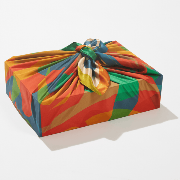 Colorful fabric wrap on a box with a white background