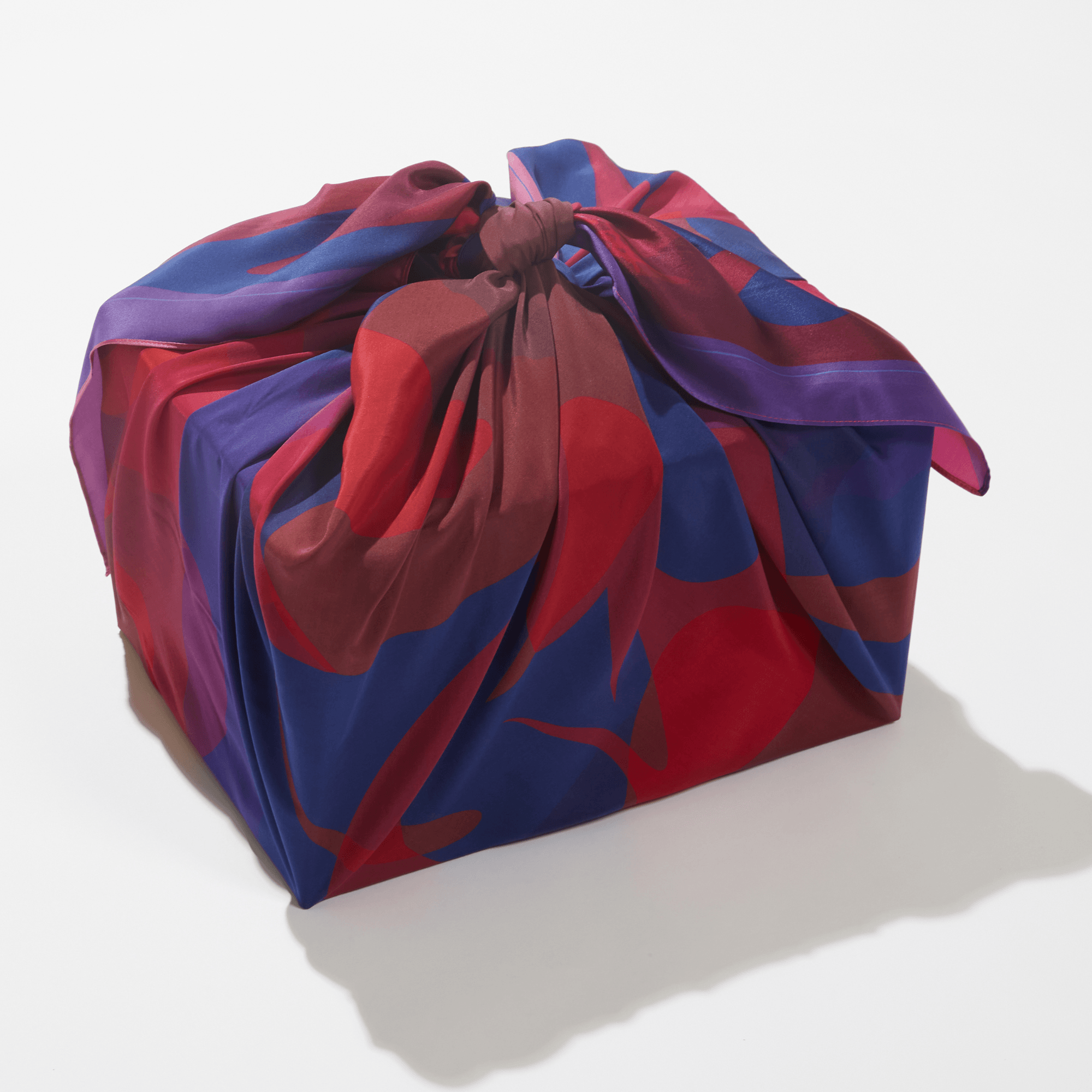 Colorful fabric bundle on a white background
