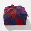 Colorful fabric bag with abstract pattern on a white background