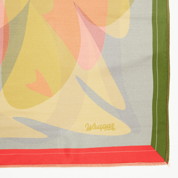 Colorful fabric with abstract patterns and 'Whaoo' branding on a white background