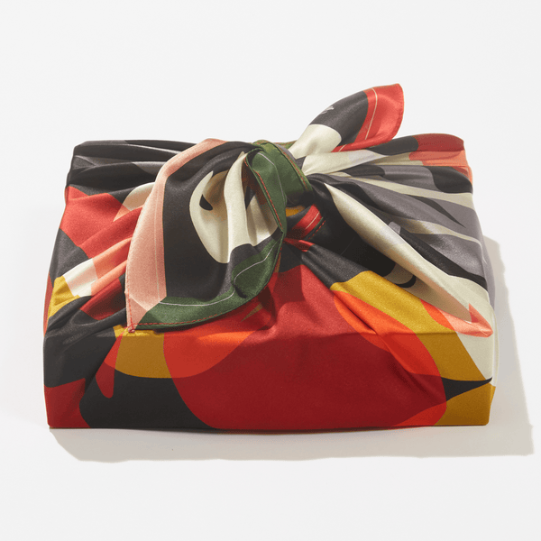Colorful fabric wrap with a knot on a white background