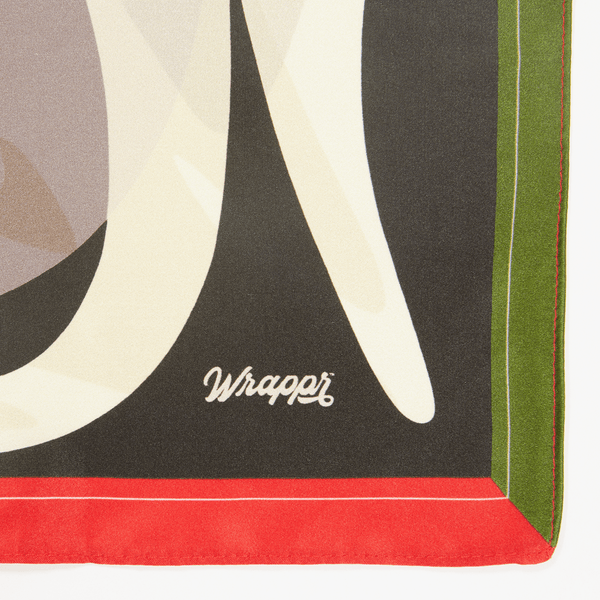 Close-up of a decorative paper with geometric shapes and the brand 'Wrapper' visible.